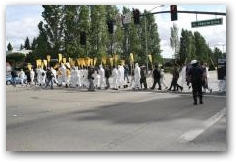 Protestors march along Chevron Drive in San Ramon  -> Click to enlarge